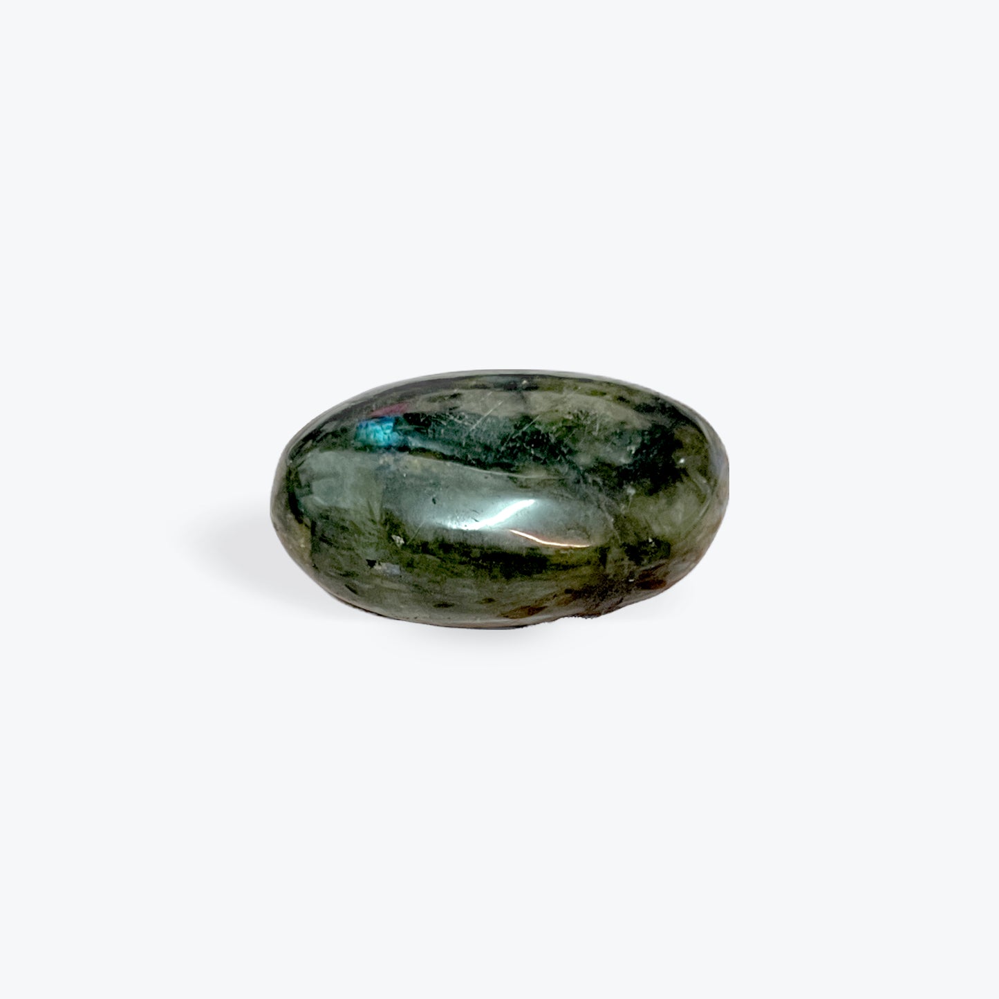 A Labradorite palm stone, approximately 5cm, showcasing a mesmerizing play of electric blues, greens, and greys, polished to reveal its natural iridescence, symbolizing transformation and intuition. | Simply Esoteric