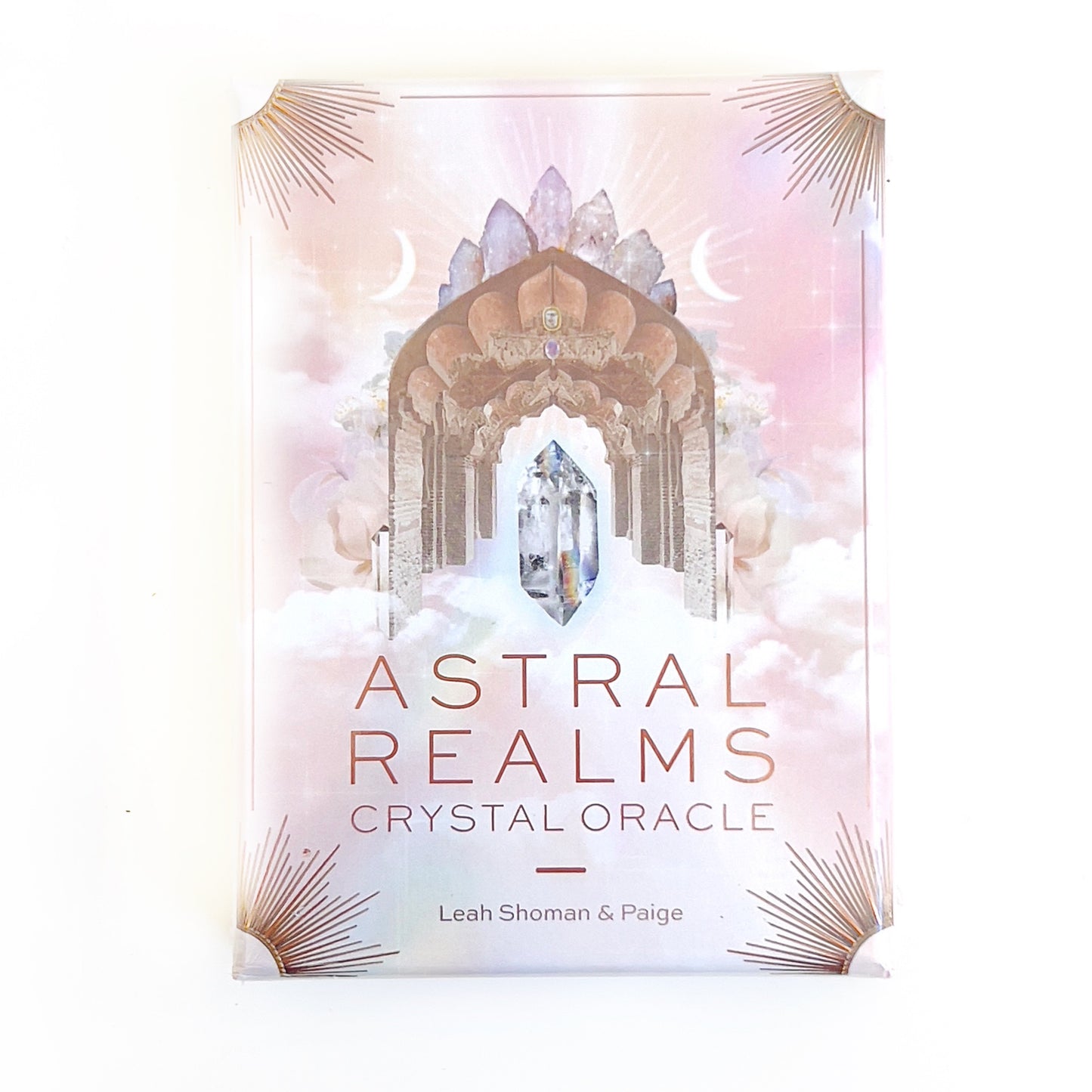 The "Astral Dreams Crystal Oracle" card deck by Leah Shoman & Paige, featuring beautifully illustrated cards that combine the energies of crystals with astral symbolism for spiritual guidance and personal growth. | Simply Esoteric