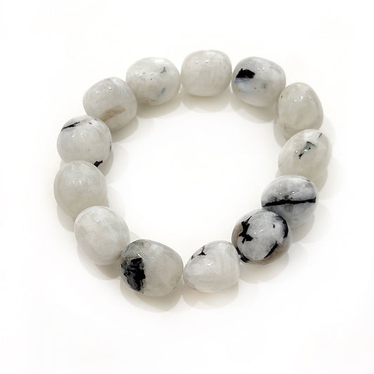 A Moonstone Tumble Bracelet, featuring beads of soft luminous hues with an ethereal glow, each around 12-15mm, embodying the mystical energy of the moon and symbolizing new beginnings and intuition. | Simply Esoteric