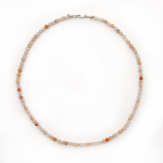 A delicate pink aventurine bead necklace with 6mm beads, pearl-knotted on silk thread, approximately 45cm in length, featuring a sterling silver clasp, embodying elegance and positive energy. | Simply Esoteric