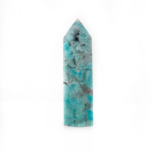 A 7cm tall Amazonite & Smokey Quartz tower, featuring layered hues of soothing turquoise from the Amazonite and deep, translucent grays of Smokey Quartz. This elegant crystal tower combines the calming properties of Amazonite with the grounding energy of Smokey Quartz, ideal for enhancing tranquility and protection in any space. | Simply Esoteric