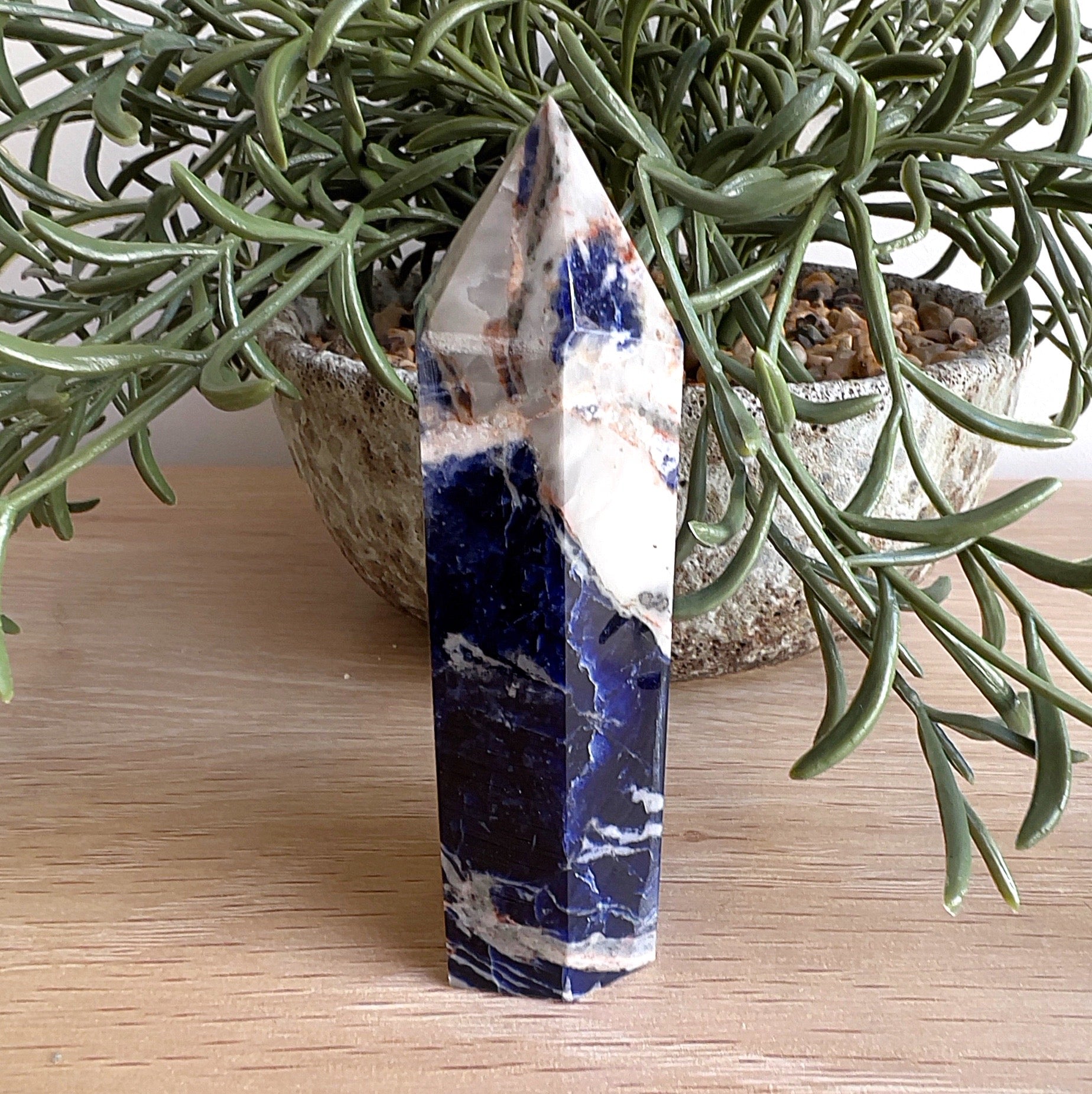 Sodalite crystal point 10cm – deep blue polished crystal for intuition, clarity, throat chakra healing, and meditation. | Simply Esoteric